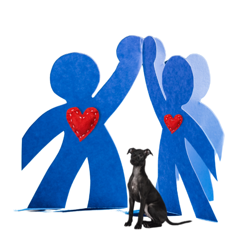 paper cutouts in the shape of people with plush hearts in the center in their chests, a short haired dog with floppy ears sits between them